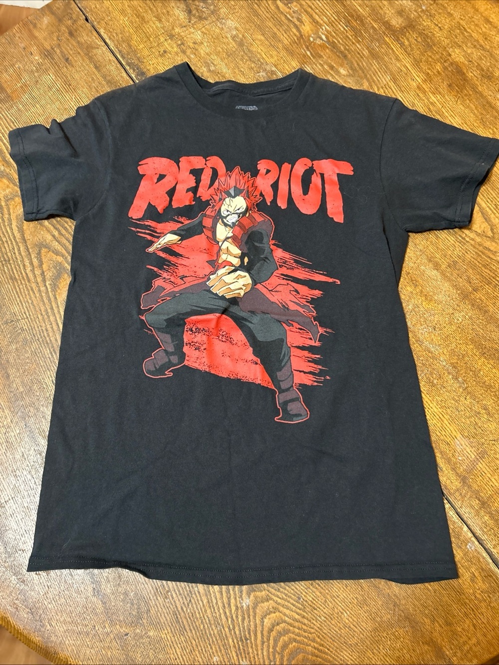 Black Graphic Tee with Bold Red 'RED RIOT' Design